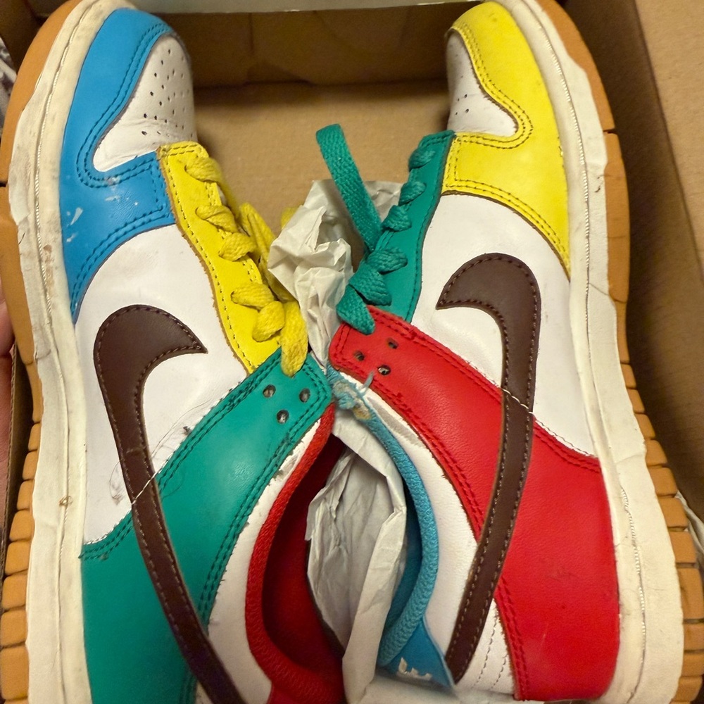 Nike Kids FREE 99 Sneakers in Red, Yellow, Blue, and White